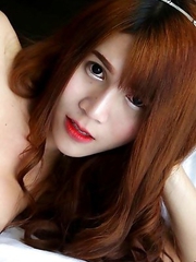 18 year old sexy Thai with long red hair and busty ladyboy Phone strips