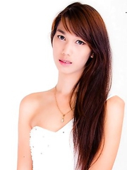 Pim is a true Bangkok beauty, tall, fair skin, beautiful body with long legs, nice cock and a very cute face. Her skin is flawless and she will keep h