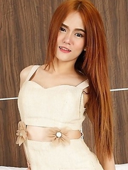 Super hot red head angel Ping is eager to take off her dress and show off her lovely big tits and tasty ass.