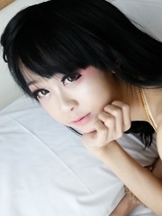 Cute 19yo Thai ladyboy Guitar enjoys herself a big white dick