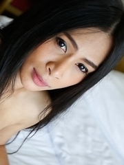 Sexy Thai ladyboy Pang  sucking big white cock