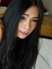 Sexy Thai ladyboy Pang  sucking big white cock